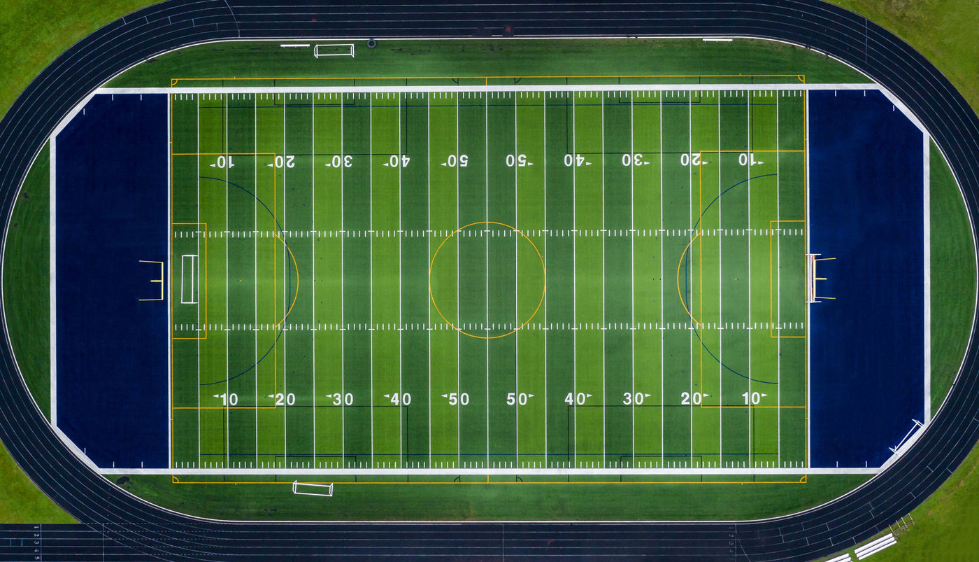Photo of football sport stadium, top down view.